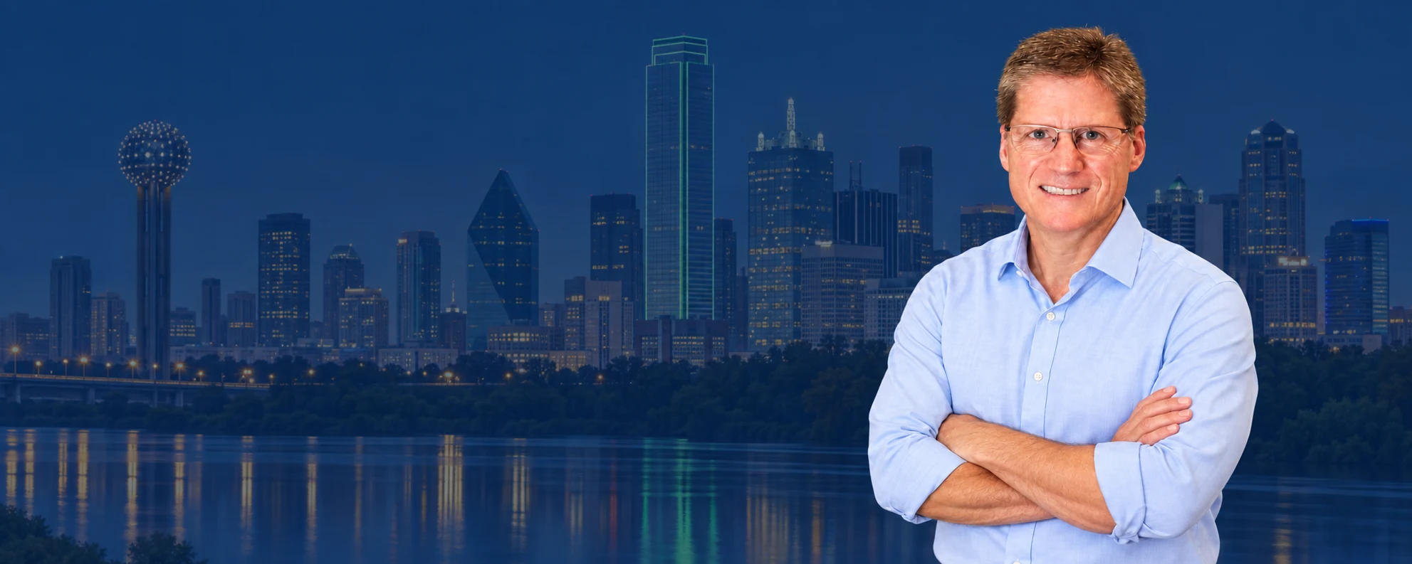 Darren Gardner in a light blue shirt against the Dallas skyline